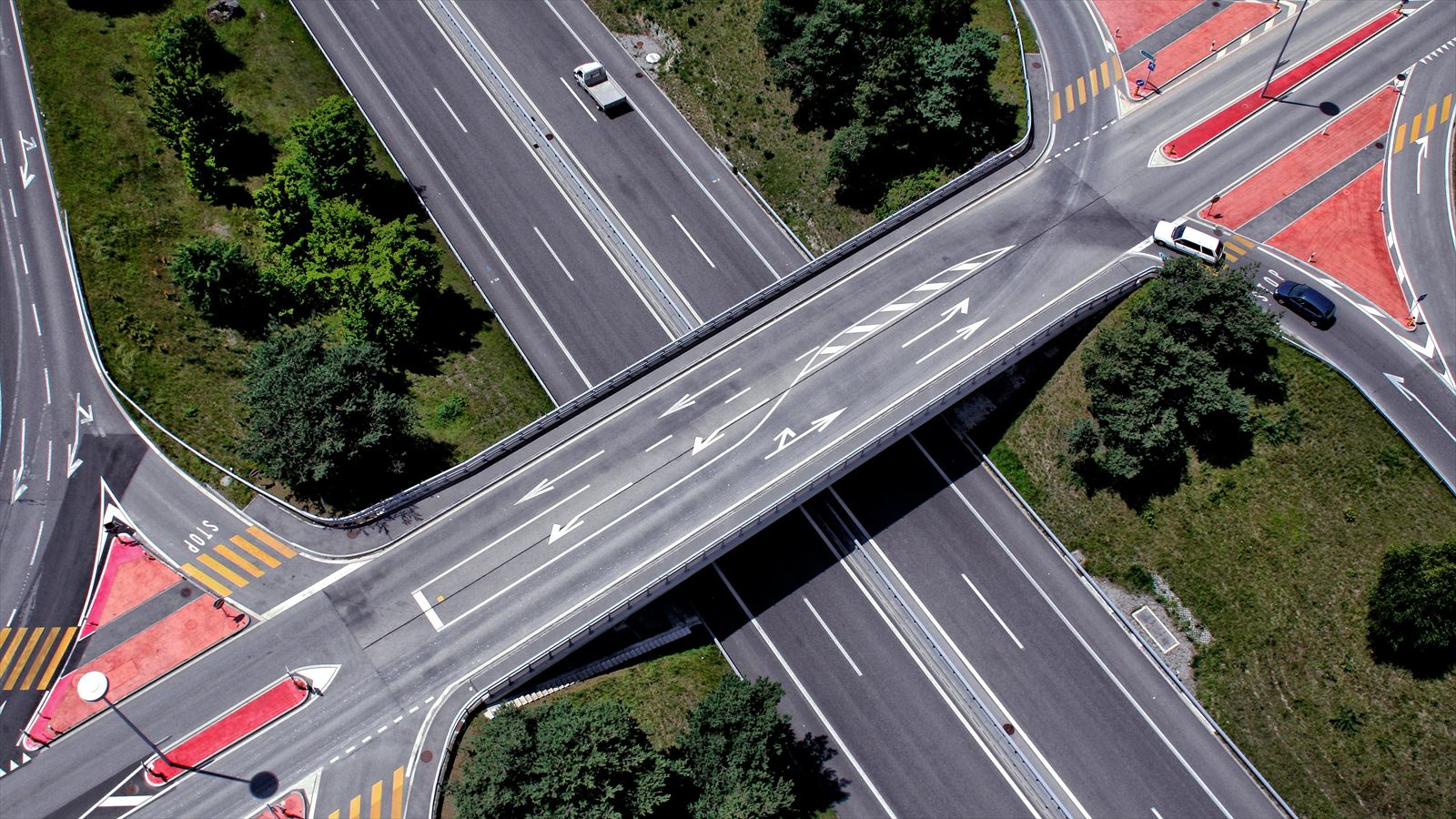 Aerial view of crossing roads with marked traffic lanes
